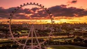 Roda-Rico imagem mostra roda rico com pôr do sol ao fundo