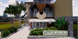 imagem mostra fachada de casa de adoção de pets com jardim em volta